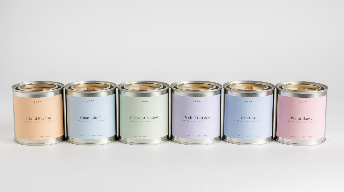 Set of six candles with labeled names on a white background