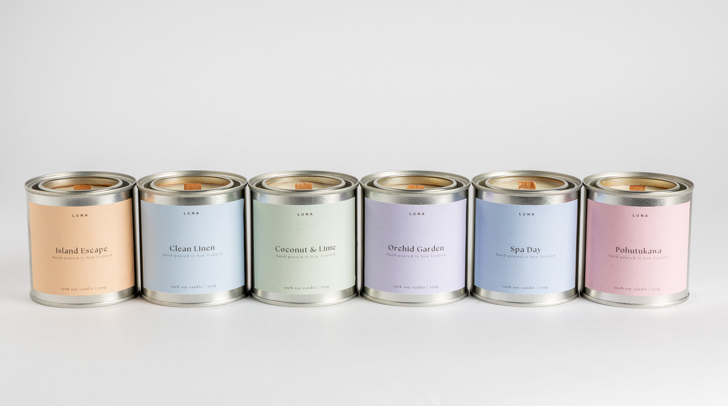 Set of six candles with labeled names on a white background