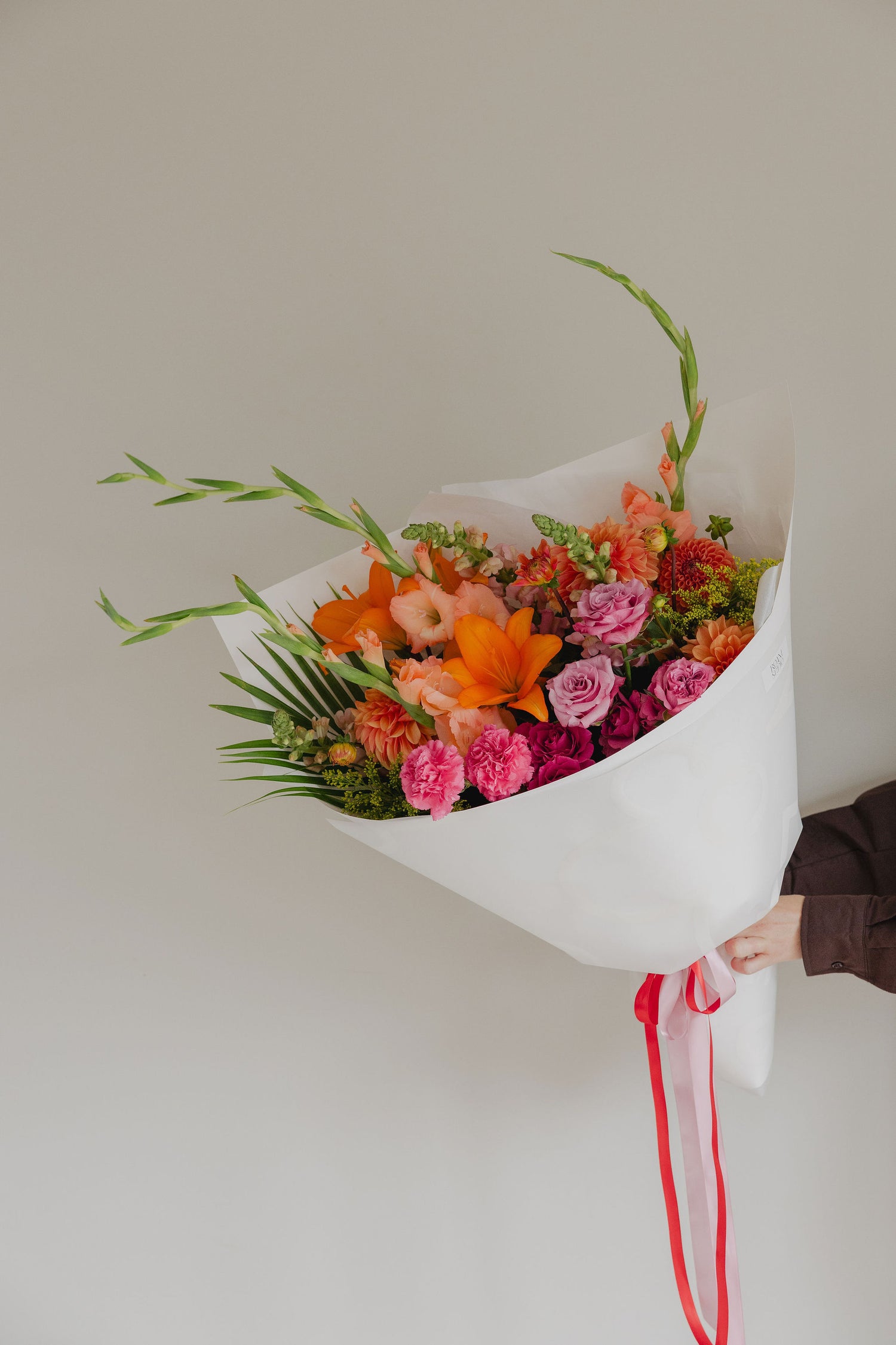 Firecracker bright bouquet with vibrant seasonal blooms