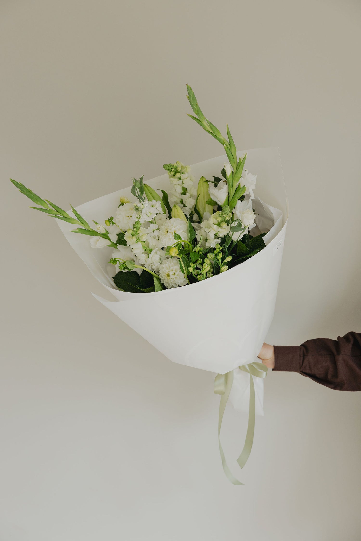 Simple Pleasures white and green bouquet gift wrapped for delivery