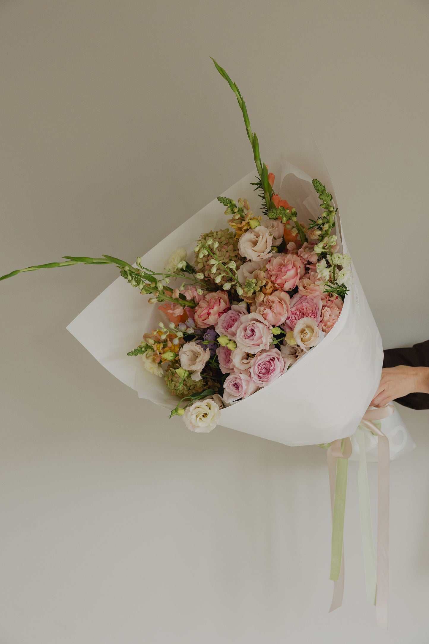 Watermelon Sugar flower bouquet close-up in blush and peach tones