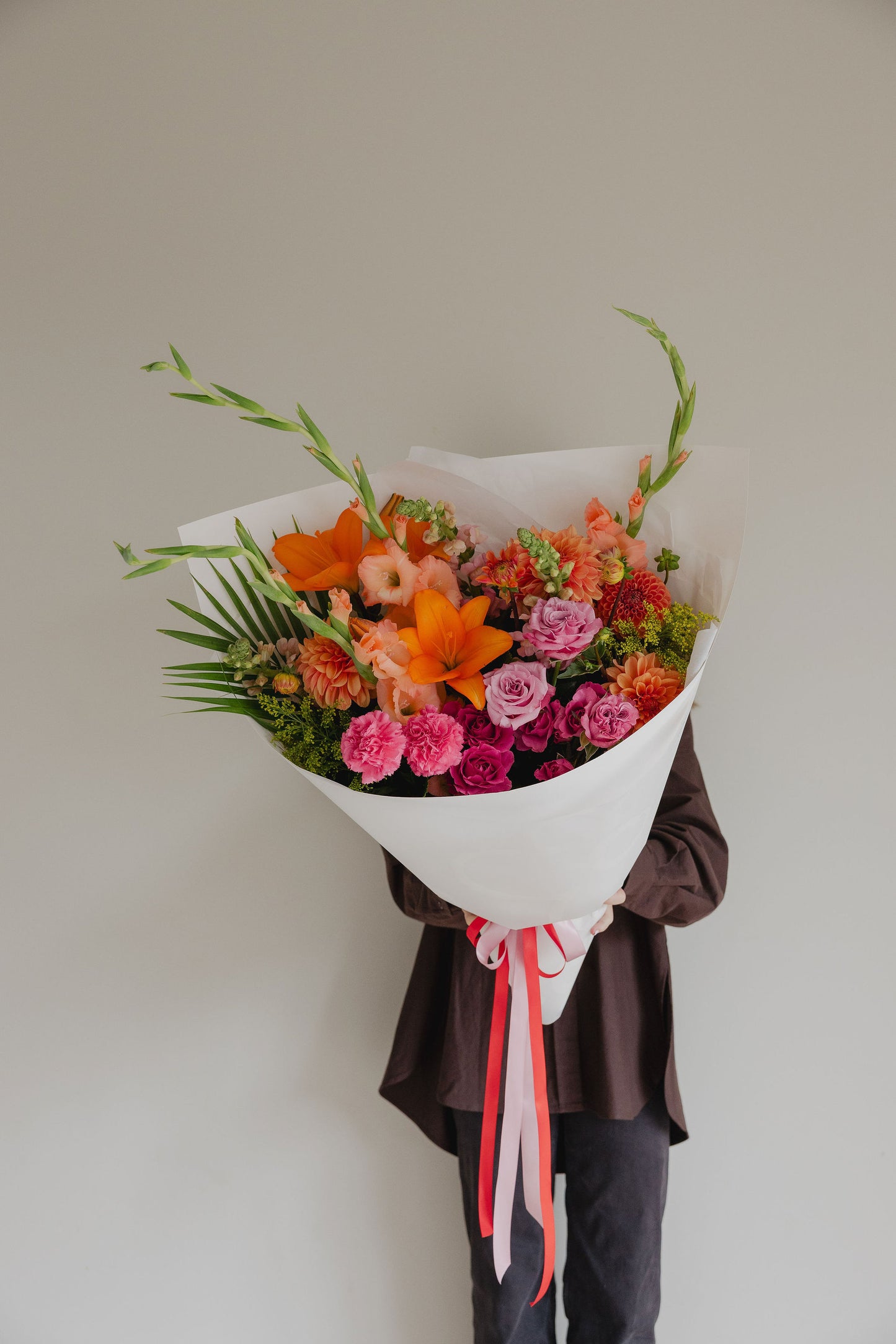 Firecracker bright flower bouquet by Roam Studio Florist Tauranga
