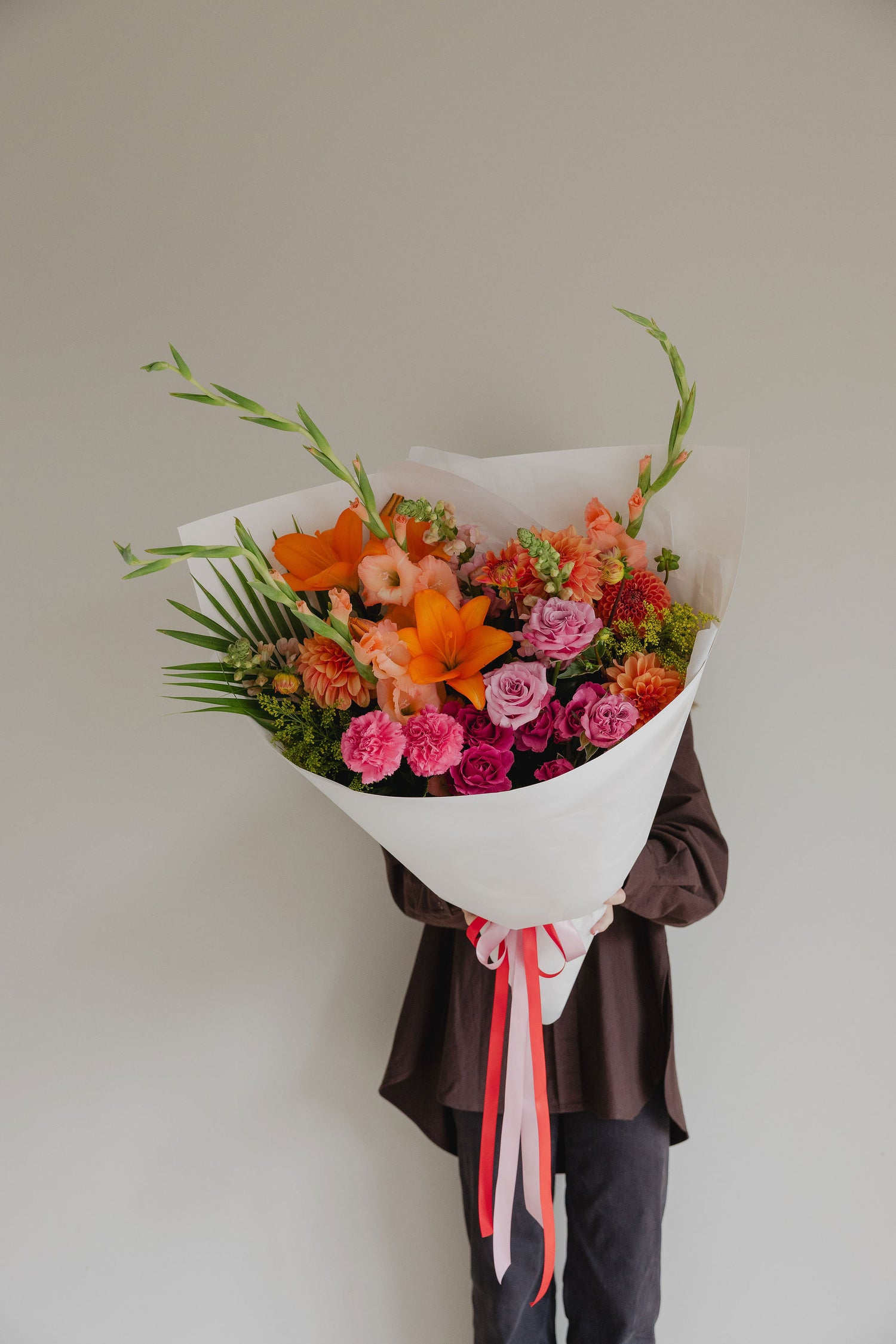 Firecracker bright flower bouquet by Roam Studio Florist Tauranga